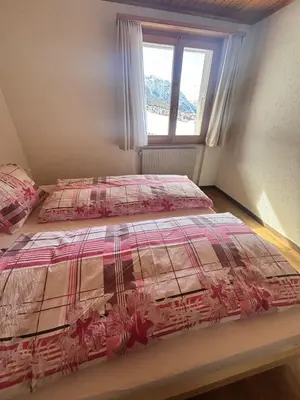 Ein Bett oder Betten in einem Zimmer der Unterkunft Gaby