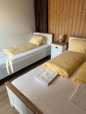 Ein Bett oder Betten in einem Zimmer der Unterkunft Apartment CARMEN
