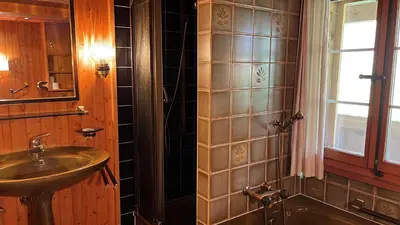 Ein Badezimmer in der Unterkunft Chalet ALPEN LOTUS
