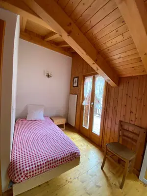 Ein Bett oder Betten in einem Zimmer der Unterkunft Auberge du Val des dix