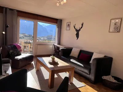 Ein Sitzbereich in der Unterkunft Besso Miège Spacieux, situation idéale pour visiter le Valais