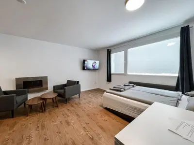 Ein Bett oder Betten in einem Zimmer der Unterkunft Mountain Retreat Studio: Idyllische Ferienwohnung in Saas-Fee