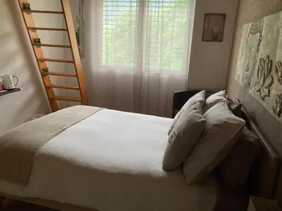 Ein Bett oder Betten in einem Zimmer der Unterkunft Les balcons du Rhône