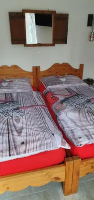 Ein Bett oder Betten in einem Zimmer der Unterkunft L'Aurosée