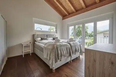 Ein Bett oder Betten in einem Zimmer der Unterkunft Terrace Vista Interlaken