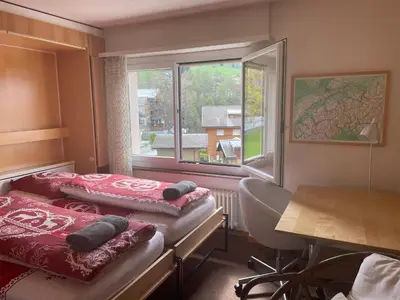 Ein Bett oder Betten in einem Zimmer der Unterkunft Ideally located 3.5 rooms flat