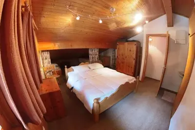 Ein Bett oder Betten in einem Zimmer der Unterkunft Eperon 8 Localisation idéale