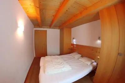 Ein Bett oder Betten in einem Zimmer der Unterkunft Ryad D quelle vue!