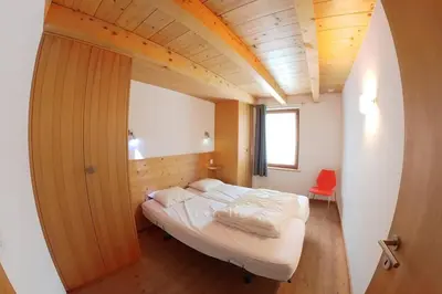 Ein Bett oder Betten in einem Zimmer der Unterkunft Ryad D quelle vue!